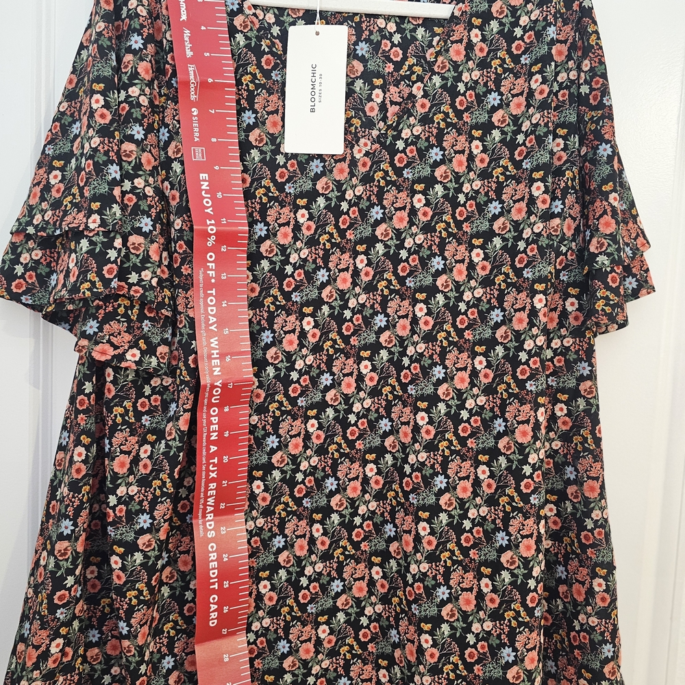 BloomChic Black Dress with Floral Patterns